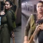 RPF woman constable carries child