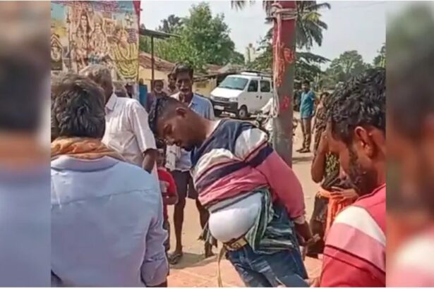 Man Tied to Pole